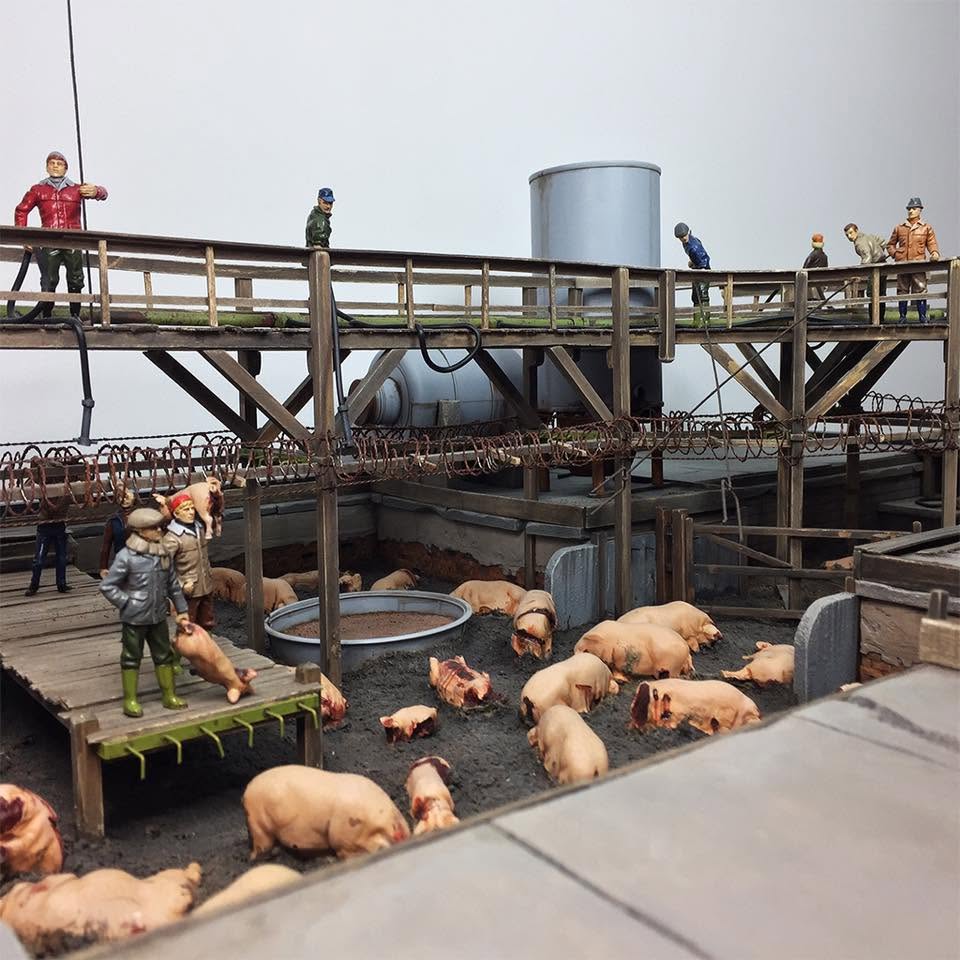 Shooting Dead Pigs, a miniature installation by Dale Christopher Wells